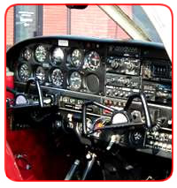 The instrument panel and dual controls of a Midland Air Training Piper Cherokee